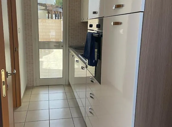 Ferienhaus Iron House Torre Suda